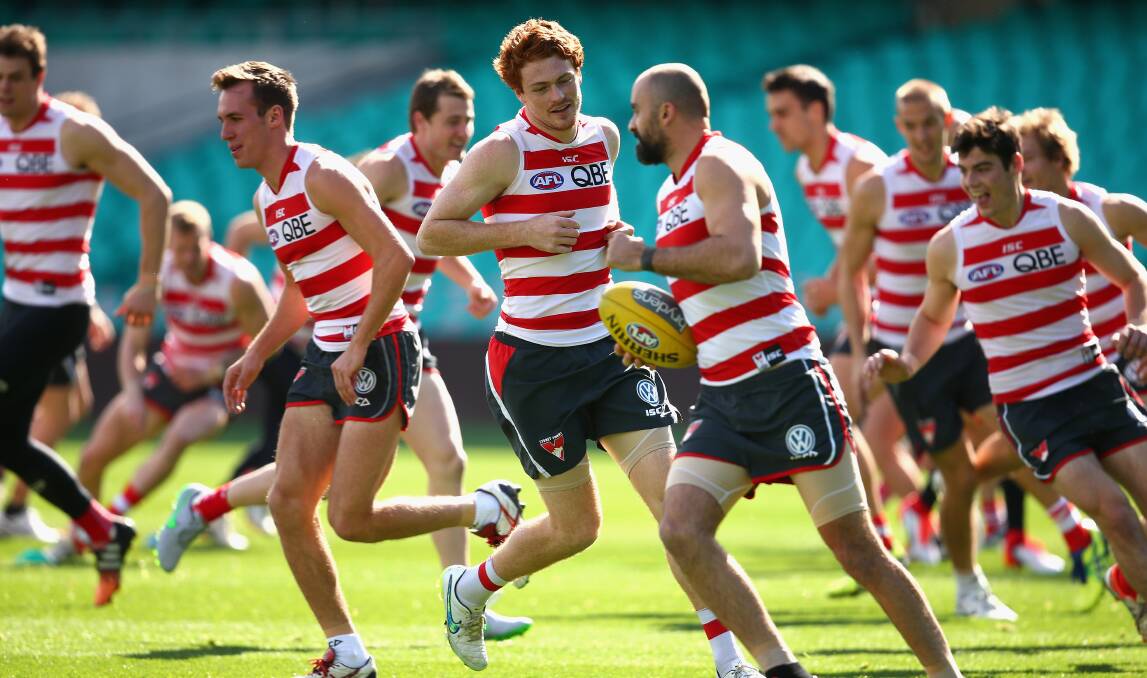 Gary Rohan and his Swans teammates during a training drill at the SCG. Picture: GETTY IMAGES