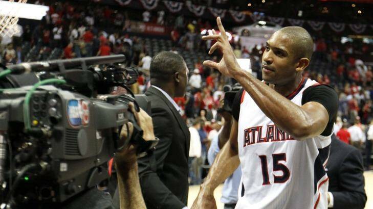 Salute: Hawks centre Al Horford celebrates the win against the Washington Wizards after Game Five. Photo: Kevin C. Cox