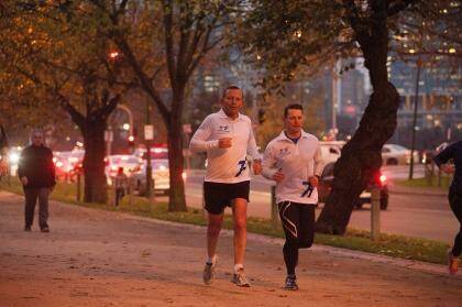 Prime Minister Tony Abbott, seen out jogging in Melbourne on Friday, said the government stopped people-smuggler boats ''by hook or by crook''. Photo: Josh Robenstone