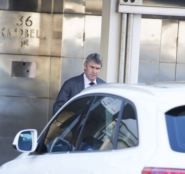 David Gyngell leaves James Packer's Bondi Beach home on Monday morning. Picture: INF