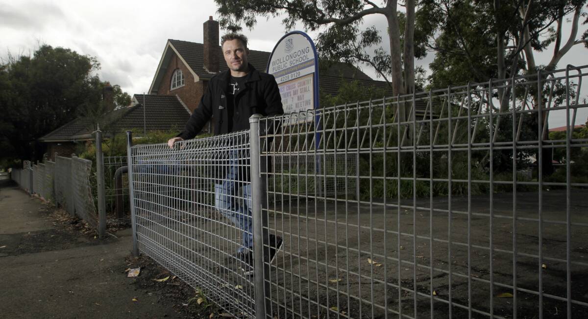 Concern: Jon Masters is pushing for a more secure fence along Wollongong Public School's boundary.Picture: ANDY ZAKELI