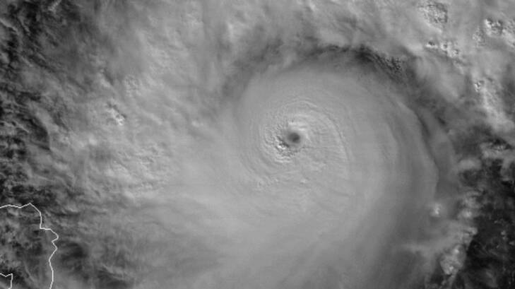 Typhoon Nock-ten, also known as Nina, strengthens as it approaches the Philippines. Photo: Himawari-8 