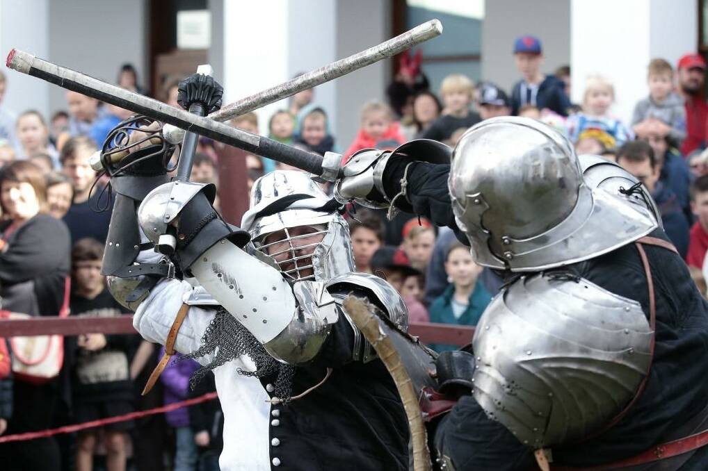 The Magna Carta's 800th anniversary was ample excuse for Lord Rubin Doubache (Robert Young, left) and Gabriel van Dorne (Luke Swadling) to don armour and indulge in heavy combat. Photo: Jeffrey Chan