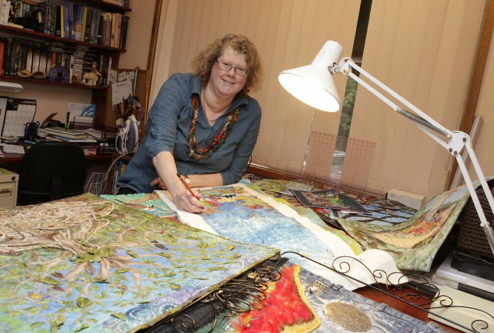 Textile artist Dale Robson with her quilts, which will be part of a major exhibition at the end of August. Picture: ANDY ZAKELI