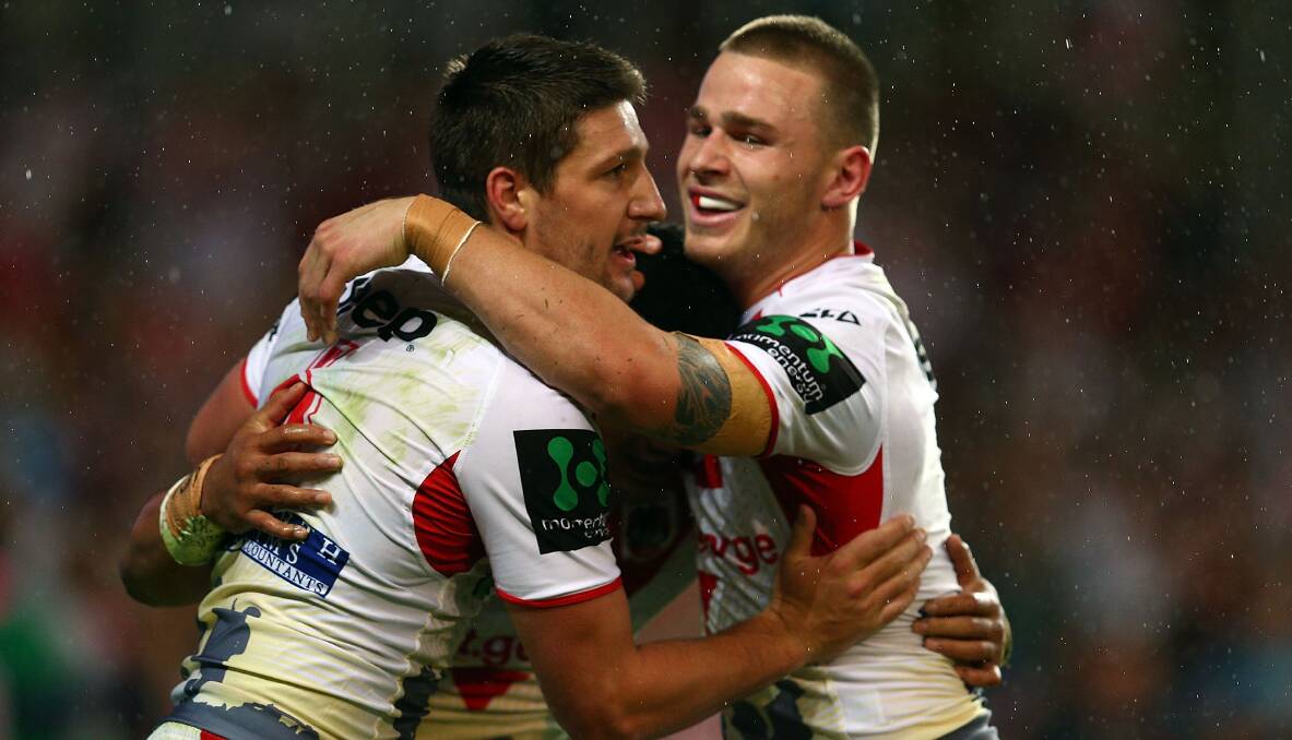 Gareth Widdop and Euan Aitken of the Dragons celebrate Peter Mata'utia's try. Picture: GETTY IMAGES