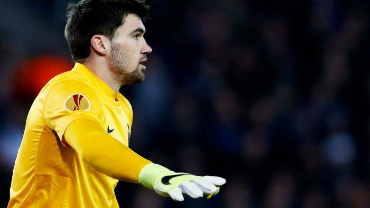 In demand: Mat Ryan signals to a Club Brugge teammate. Photo: Dean Mouhtaropoulos