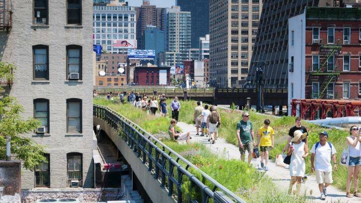 People walk the New York High Line, an elevated park along 10th Avenue. Photo: iStock
