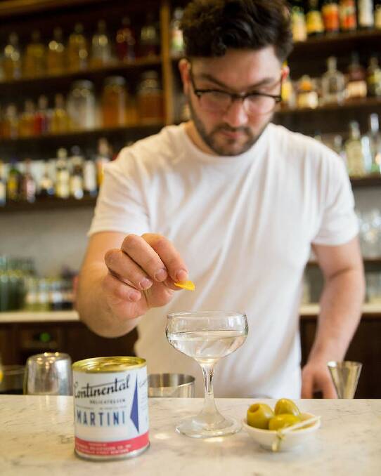Mikey Nicolian prepares a tinned martini. Photo: Michele Mossop