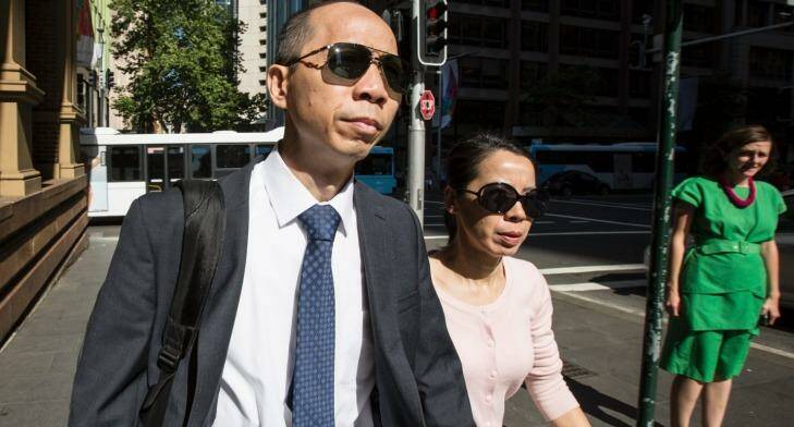 Robert Xie and his wife Kathy Lin arrive at Supreme Court in King Street, where he is on trial for the murdering five members of her family. Photo: Jessica Hromas