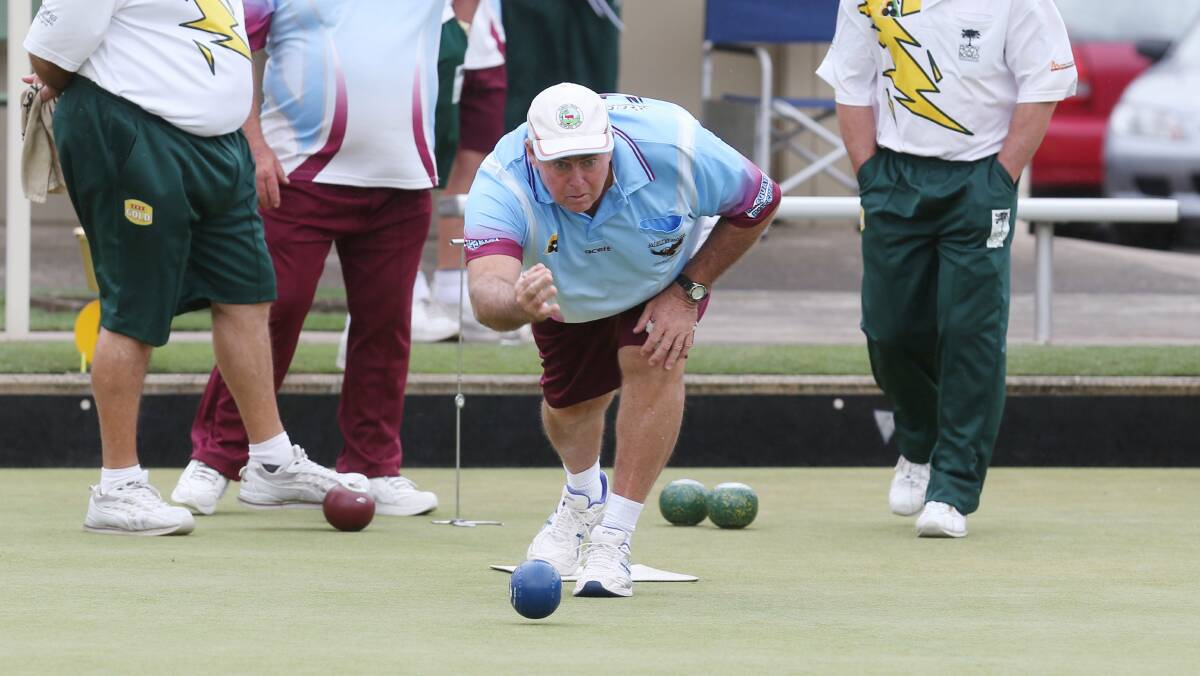 Albion Park's Charlie Cheetham sends down his bowl during the Park's big Grade 1 pennants win over Figtree RSL. The Park are just three points behind the fourth-placed Figtree RSL. Picture: ROBERT PEET
