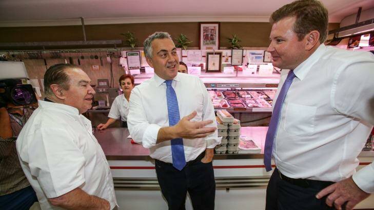 Treasurer Joe Hockey with business owner Giovanni De Romanis and local federal MP Craig at Five Dock Meat Markets on Saturday. Photo: Dallas Kilponen