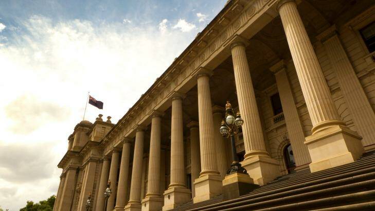 Politicians had rifle placement slits installed high on the front of the Victorian Parliament in the 1880s to shoot rioting voters. Photo: Matthew Piper