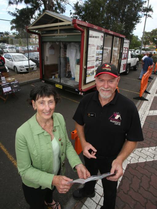 Wollongong councillor Jill Merrin and ADRI house curator Geoff Wicks with Betty the asbestos display house. Picture: ROBERT PEET