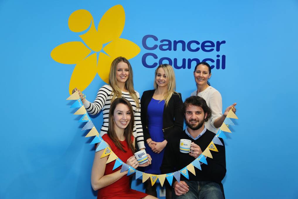 Nearly set: JCI Illawarra members Katie Mazzoni, Tania Lincoln, Naomi Brown (back row), and Jess Pinkerton (front) with Cancer Council southern regional manager Toby Dawson. Picture: GREG ELLIS