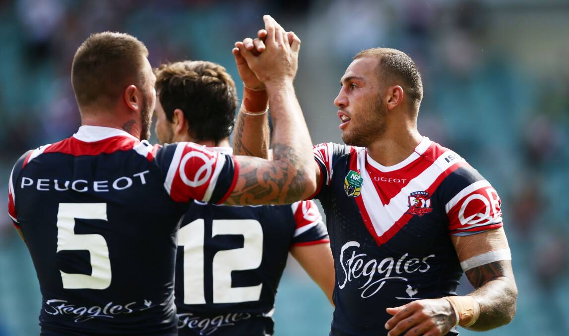 Blake Ferguson (right) celebrates his try with Roosters teammates on Sunday. Picture: GETTY IMAGES