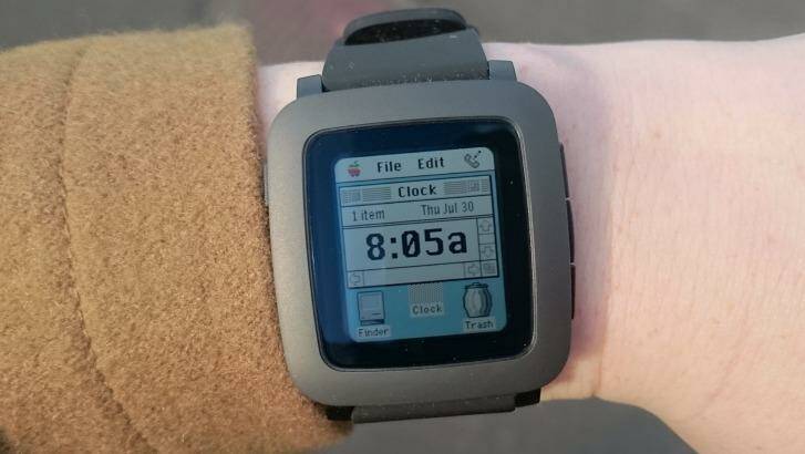 A different kind of Apple Watch: Pebble Time's e-paper display looks great and lets the device last for days. Plenty of retro-looking watchfaces with little regard for copyright is a bonus. Photo: Tim Biggs