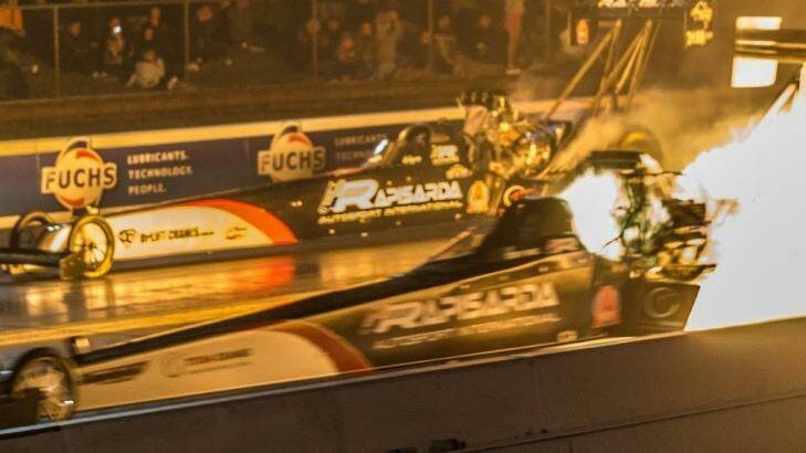 Cory McClenathan's spectacular firey victory in the top fuel final at the Fuchs Winternationals at Willowbank.  Photo: Rory O'Chee