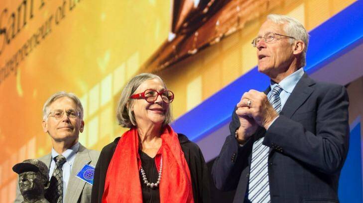 Jim Walton (from left), Alice Walton and Rob Walton talk on stage during the annual Wal-Mart shareholders  meeting in June. Photo: Jason Ivester/The Arkansas Democrat-Gazette via AP