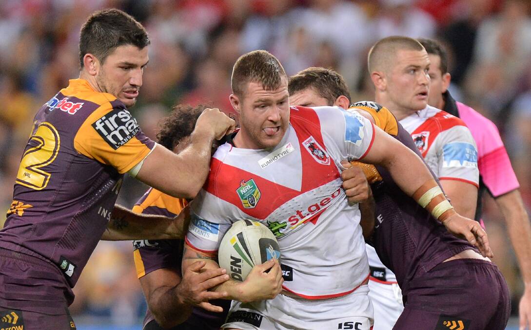 Trent Merrin, in action against the Broncos, believes good times are ahead for the Dragons. Picture: GETTY IMAGES