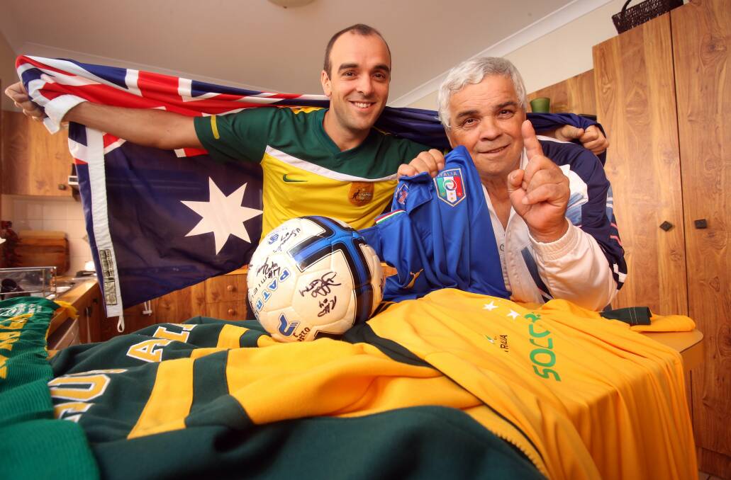 Lake Heights father and son David and Lou Ferri are now in Brazil to follow Italy's fortunes. Picture: ROBERT PEET