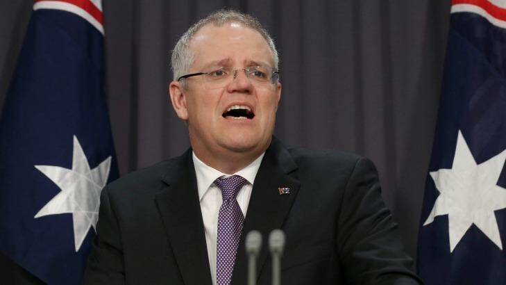 Treasurer Scott Morrison announces an inquiry into the PRRT at Parliament House in on Wednesday.  Photo: Alex Ellinghausen