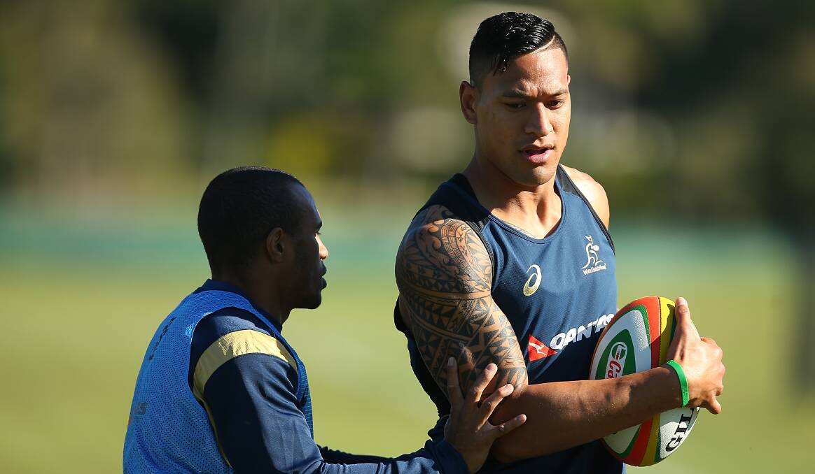 Israel Folau and Will Genia during a Wallabies training session at Sanctuary Cove on the Gold Coast on Thursday. Picture: GETTY IMAGES