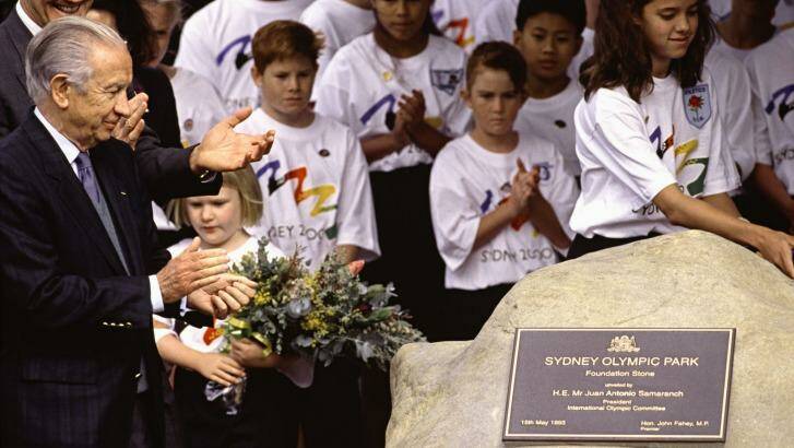 International Olympic Committee president Juan Antonio Samaranch looks on during the unveiling of a foundation stone at Olympic Park in May 1993. Photo: National Archives of Australia
