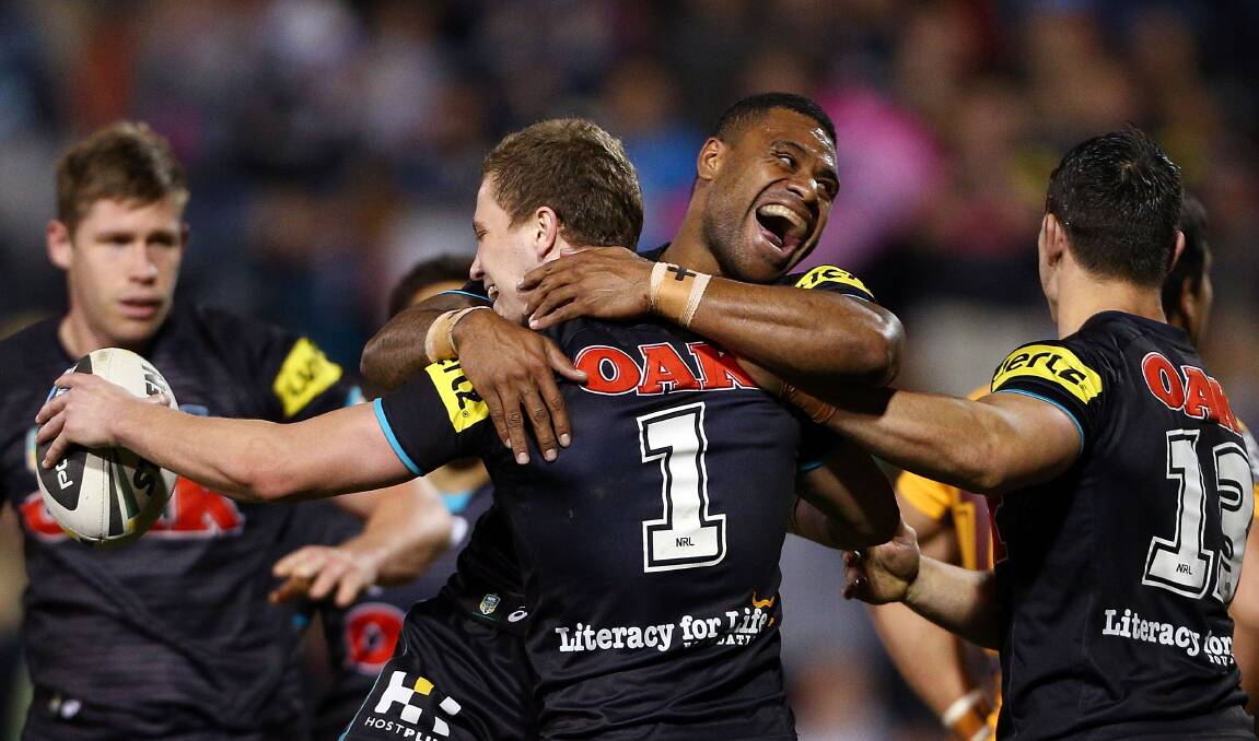 Matt Moylan and Kevin Naiqama celebrate during their 35-34 home win over the Brisbane Broncos.Picture: GETTY IMAGES
