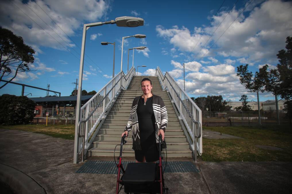 Bec Schmidt, from Unanderra Access Group, is encouraging people to sign the group's change.org petition urging better access at Unanderra station. Picture: ADAM McLEAN