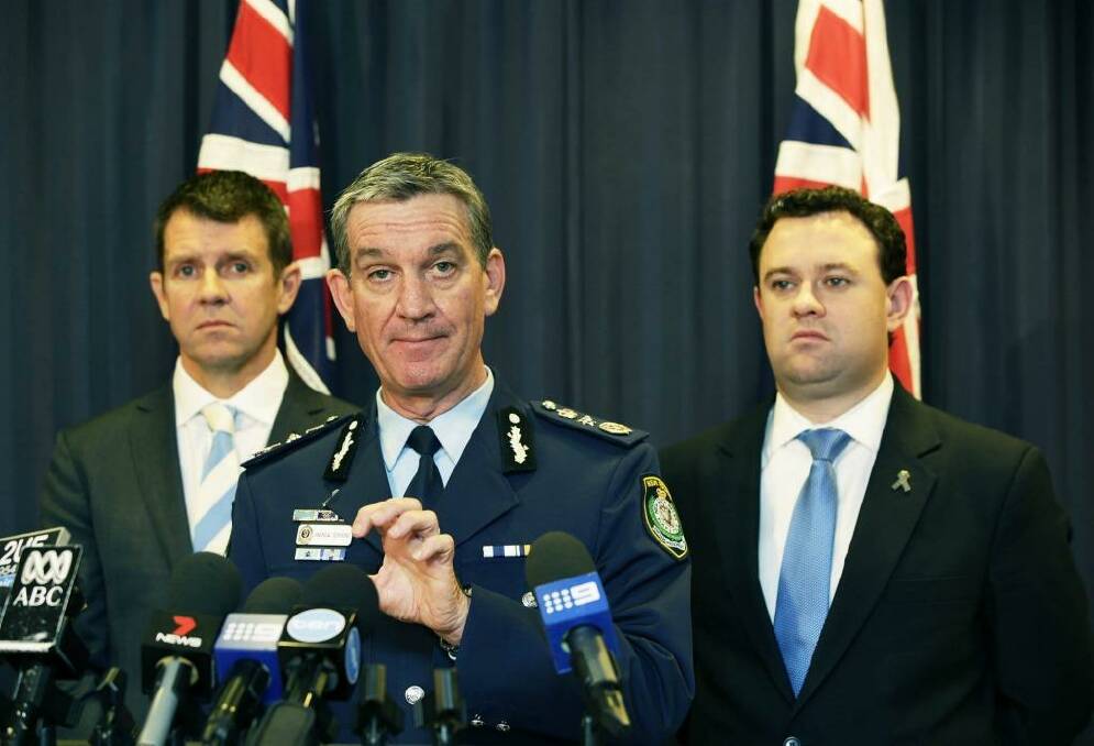 Resolute: Premier Mike Baird, NSW Police Commissioner Andrew Scipione and Police Minister Stuart Ayres addressing the media. Photo: Jessica Hromas