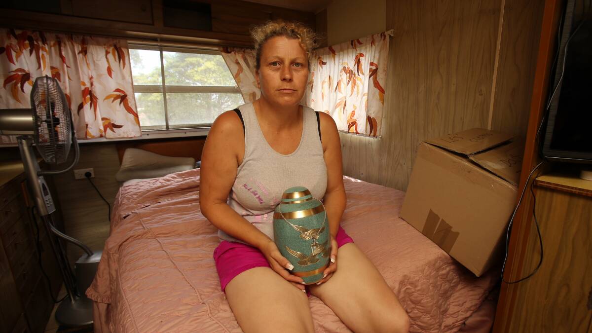 Cheryl Wheeler keeps the ashes of her husband close by after being evicted from their public housing home.  Picture: ROBERT PEET
