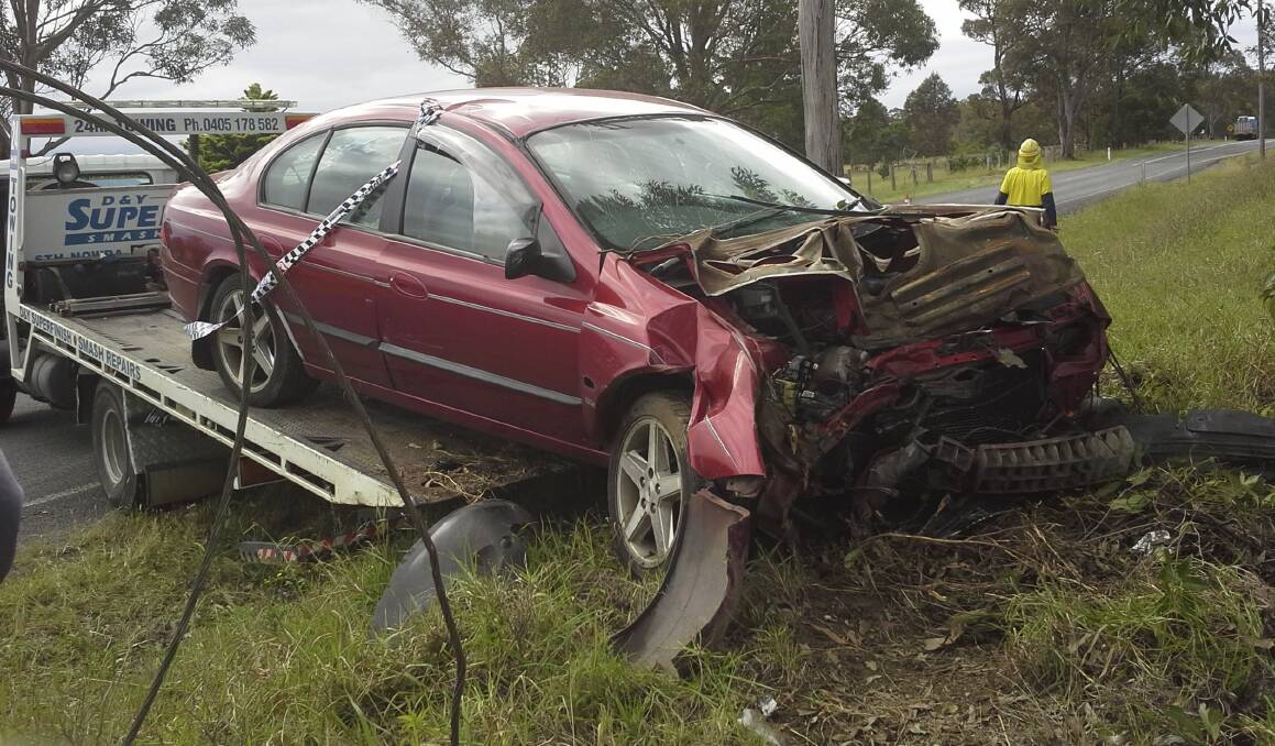 Wrecked: The Ford Falcon that crashed on Wednesday after a 26-year-old Fairy Meadow man led police on a car chase through Nowra and Worrigee. The man has been sentenced to 20 months' jail.