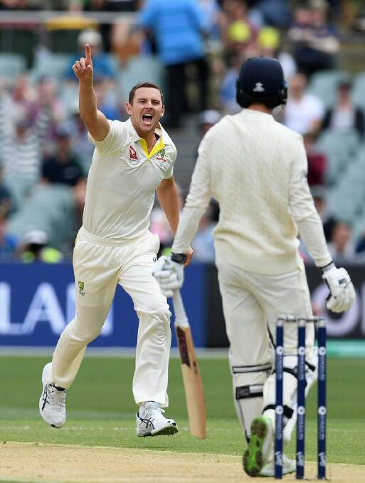 Australian bowler Josh Hazlewood celebrates dismissing England batsman James Vince for 2 runs on Day 3 of the Second Test match between Australia and England at the Adelaide Oval in Adelaide, Sunday, December 4, 2017. (AAP Image/Dave Hunt) NO ARCHIVING, EDITORIAL USE ONLY, IMAGES TO BE USED FOR NEWS REPORTING PURPOSES ONLY, NO COMMERCIAL USE WHATSOEVER, NO USE IN BOOKS WITHOUT PRIOR WRITTEN CONSENT FROM AAP