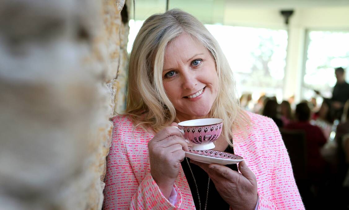 Cup of fun: Tracy Bevan at Wollongong's inaugural McGrath Foundation high tea event, to fund breast care nurses. Picture: SYLVIA LIBER
