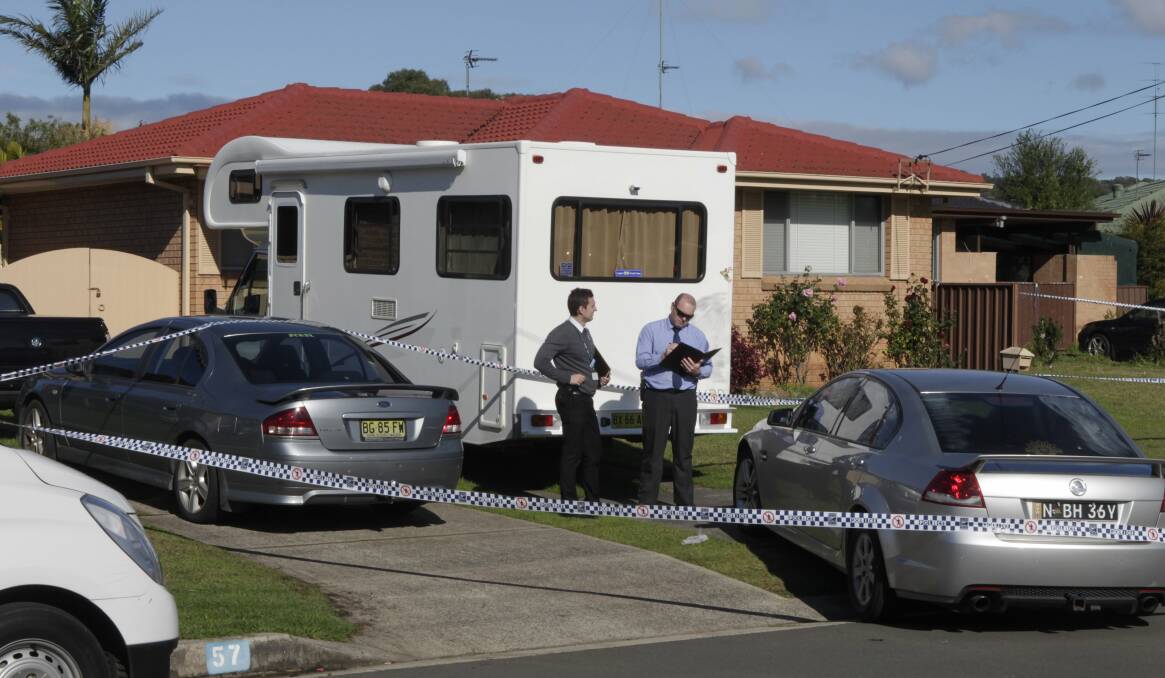 Crime scene: Police attend the scene of a shooting at Oak Flats in June. Picture: ANDY ZAKELI