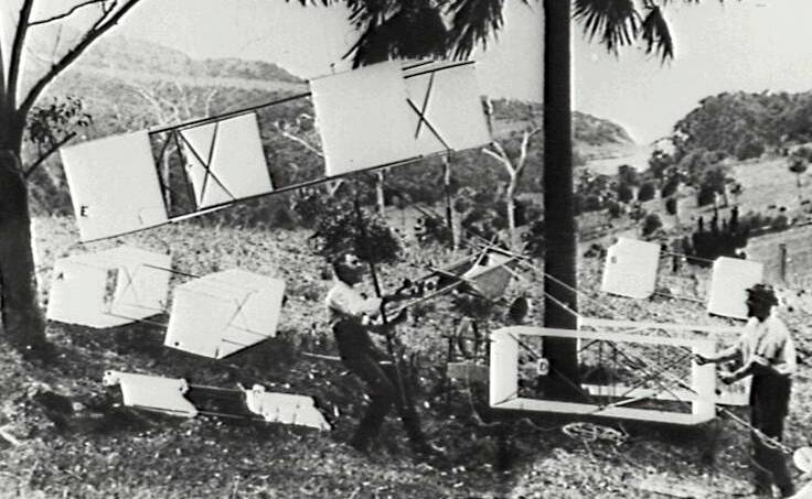 Pioneering spirit: Lawrence Hargrave and his boxkites at Stanwell Park. A luncheon commemorates his death 100 years ago.Picture: ILLAWARRA IMAGES