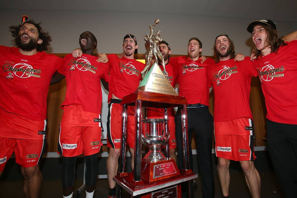The Wildcats celebrate winning the NBL grand final in Perth on Sunday. Picture: GETTY IMAGES
