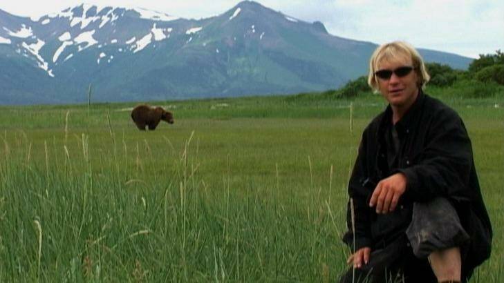 Man versus wild: Werner Herzog explores the lives and deaths of two environmental activists who lived among Alaskan grizzly bears in the fascinating docudrama <i>Grizzly Man</i>.