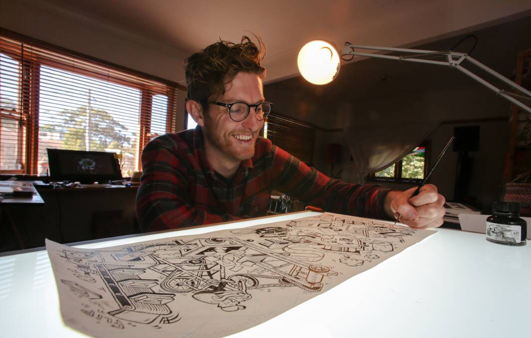 Writing a graphic novel: Comic artist Pat Grant in his home studio at Austinmer. He is part of the Comic Gong festival.Picture: ADAM McLEAN