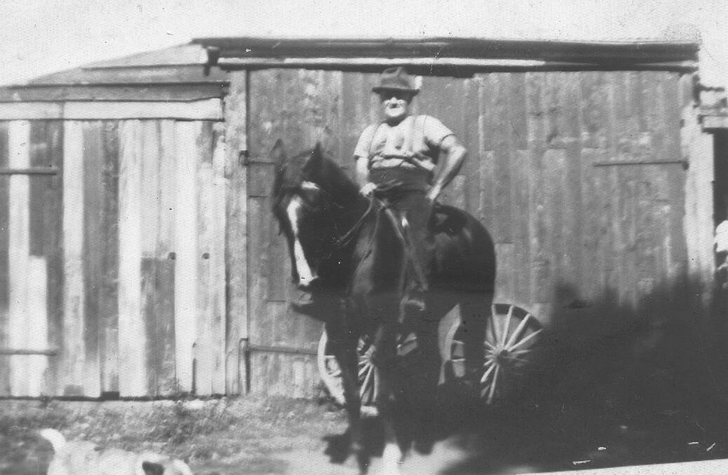 George Oxenbridge sitting on his son Jim’s horse in front of the old slab building which was once the Ryans’ home in Dymock St, Balgownie. The photo is from the 1930s. Picture courtesy of CAROL HERBEN