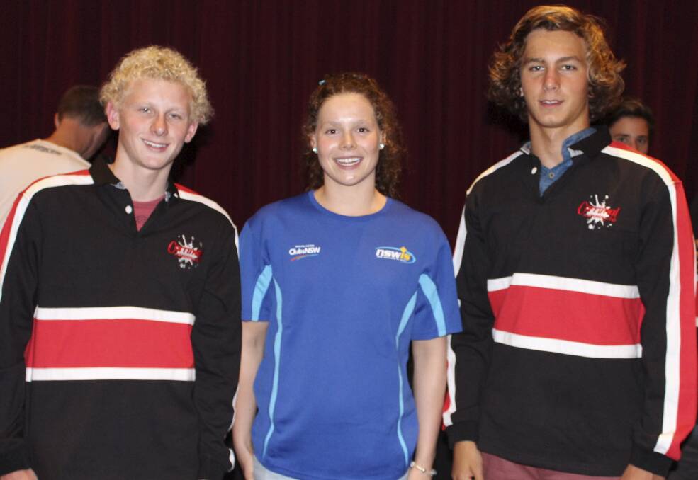 Achievers: Top Australian swimmer and 1500m freestyle record-holder Laura Crockart (centre) with Corrimal Swim Club's Nathan De Lutiis (left) and Harrison Corby (right), who both claimed the top award at the club's presentation.