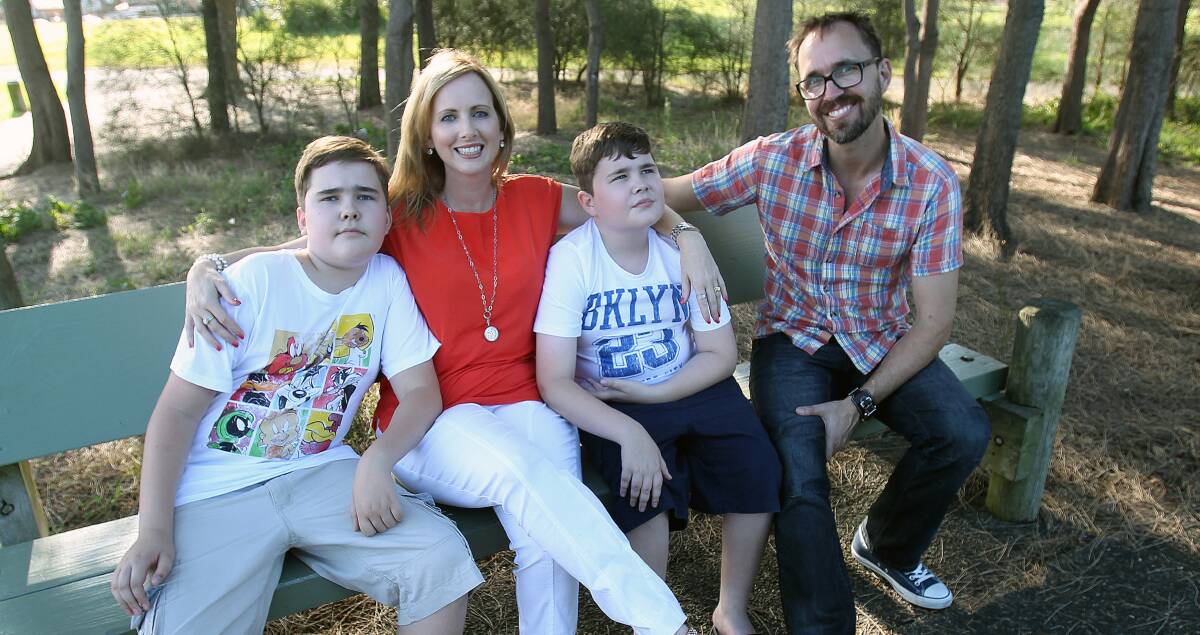 Jennifer Ratcliffe with her husband Brad and their two autistic sons Cameron, 14, and Coby, 11. Picture: GREG TOTMAN