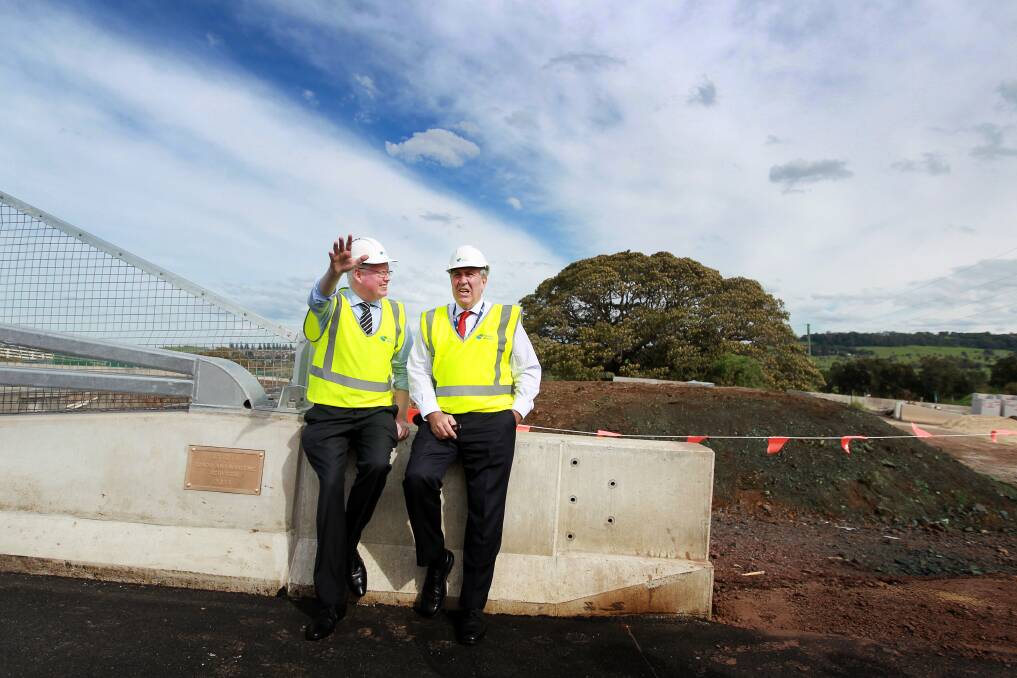 Kiama MP Gareth Ward and Roads Minister Duncan Gay survey work done on upgrading the Princes Highway. Picture: SYLVIA LIBER