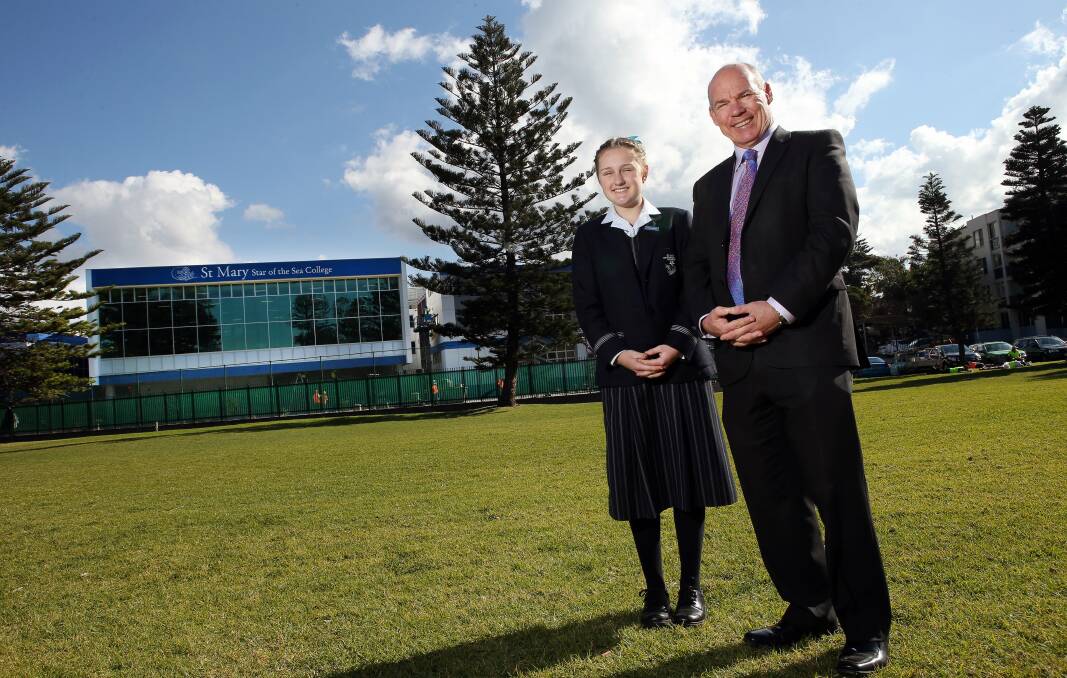 Year 9 student Eleanor Mantei and principal Frank Pitt show off the new building. Picture: KIRK GILMOUR
