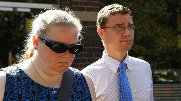 Carl Harrap leaves Manly Local Court holding hands with a woman. Photo: Daniel Munoz