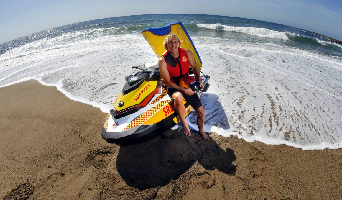 Coalcliff Surf Life Saving Club captain Rob Deacon with the jet ski donated after
club member 
Michael Jordan’s rescue of surfer Nathan Townsend in 2003. Picture: ANDY ZAKELI
