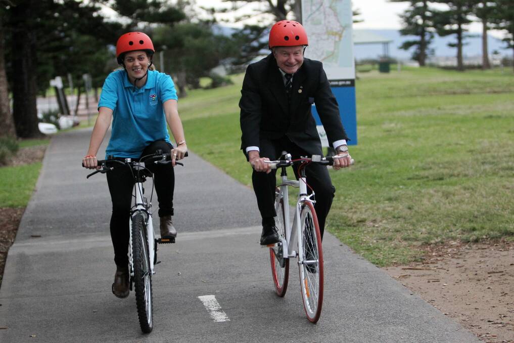 Lord Mayor Gordon Bradbery and Gemma McCrohan of the Bicycle Network test out some of the bikes that will be given to teenagers this week.  Picture: GREG TOTMAN