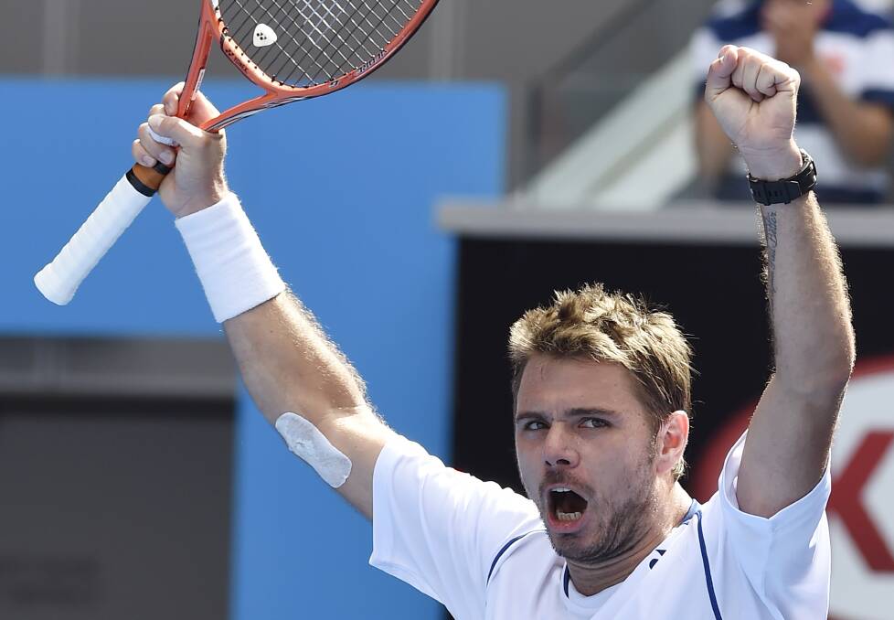 Defending champion Stan Wawrinka, of Switzerland, celebrates his fourth-round victory on Monday. Picture: AP