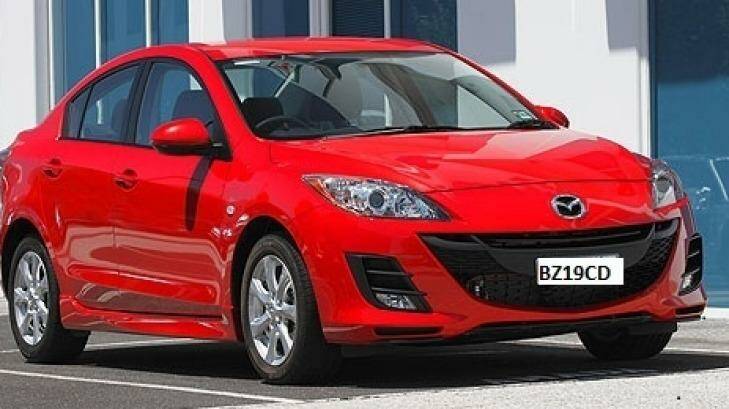 A red Mazda 3 sedan, similar to missing Leeton teacher Stephanie Scott's car. Photo: NSW Police