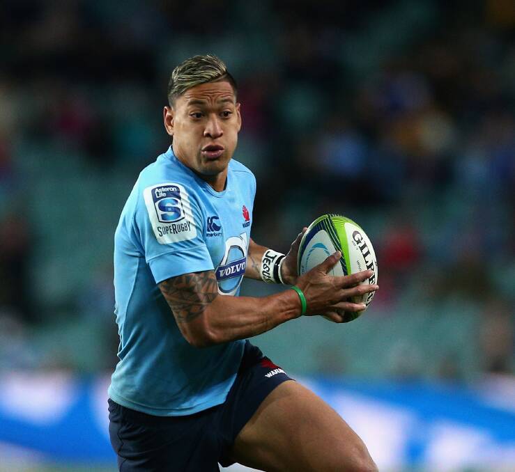Israel Folau of the Waratahs runs the ball during the round 18 Super Rugby match between the Waratahs and the Highlanders at Allianz Stadium on July 6. Picture: Cameron Spencer/Getty Images.